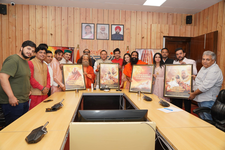 सीएम धामी ने श्री बाबा नीब करौरी महाराज पर आधारित फिल्म का प्रोमो और पोस्टर किया जारी