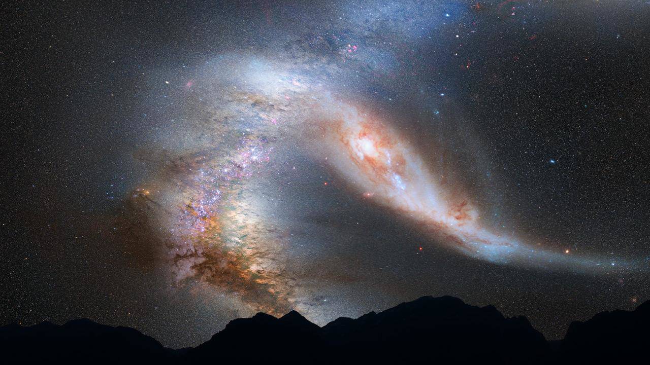 आकाशगंगाओं के मिलन की अनोखी घटना को कैमरे में किया कैद