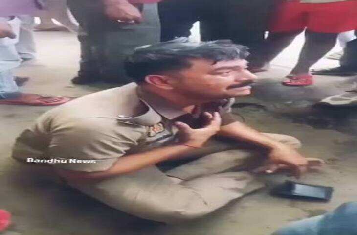Viral Video: 'मैं DM का बेटा हूं' कहता दिखा नशे में पुलिसकर्मी, सड़क किनारे सोने का वीडियो वायरल