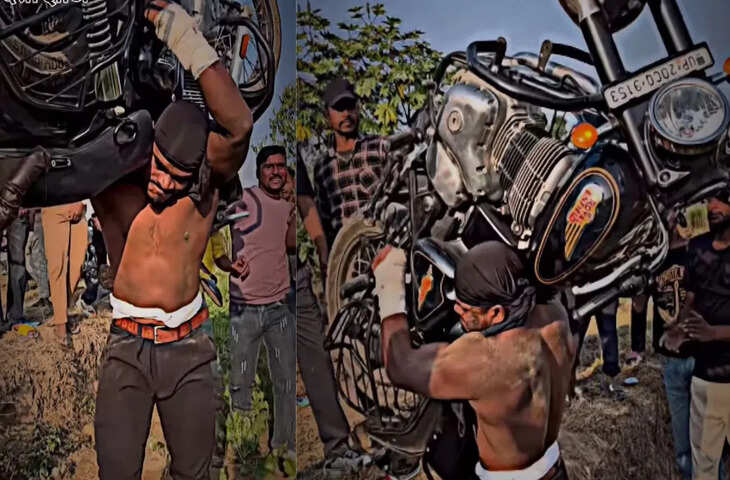 शख्स ने पलक-झपकते कन्धों पर उठा ली रॉयल एनफील्ड! देखकर उड़ गए आसपास खड़े लोगों के होश, देखे वीडियो&nbsp;