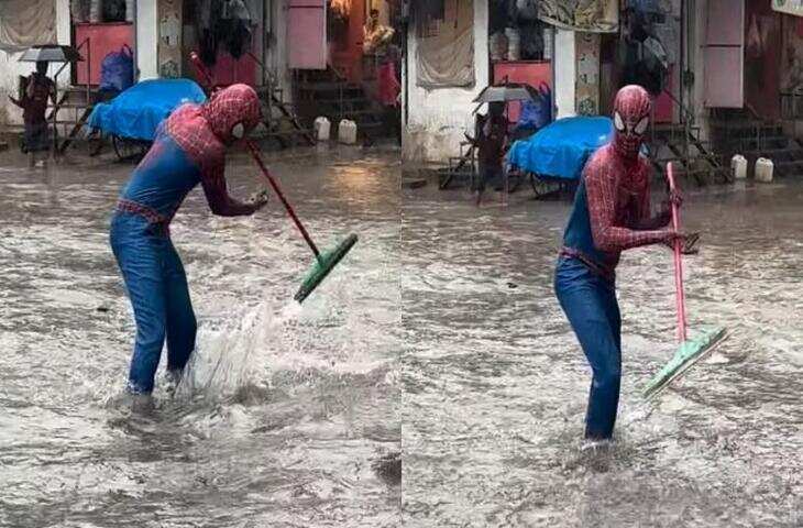 Spider-Man बनकर बाढ़ में उतरा शख्स, फंसी गाड़ियों को निकाला बाहर; इंटरनेट पर छा गया वीडियो​​​​​​​