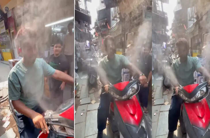 भीषण गर्मी से बचने के लिए शख्स का अतरंगी जुगाड़, स्कूटी को बना दी चलती-फिरती AC, देखें Viral Video