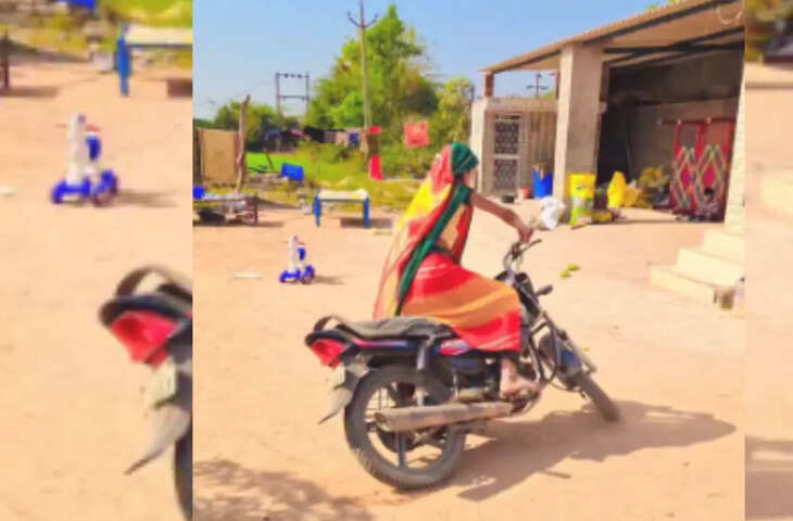 भाभी का धांसू बाइक स्टंट! घूंघट में किया ऐसा कारनामा कि सड़क पर लग गया मजमा