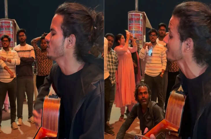 गिटार पर सुरीला गाना गाता बंदा बना लोगों का ध्यान का केंद्र