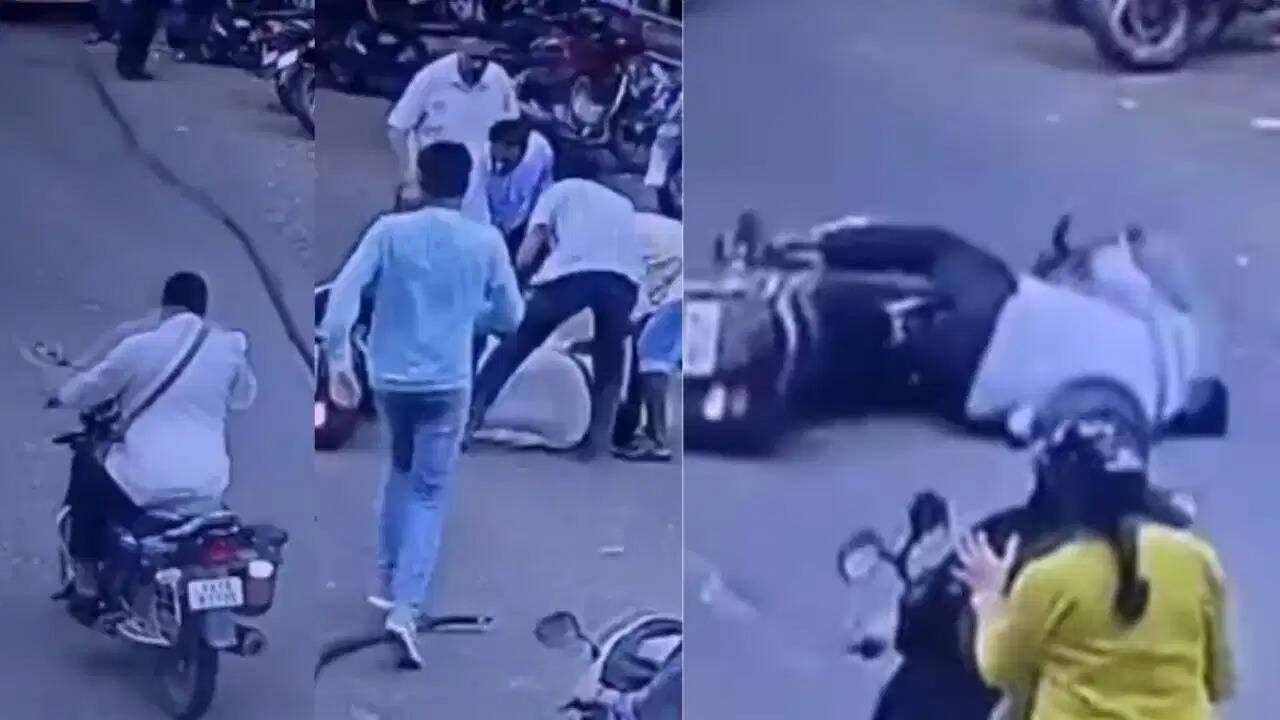 चलते बाइक सवार पर अचानक गिरी पेड़ की सूखी डाल, CCTV में कैद हुआ खौफनाक हादसा