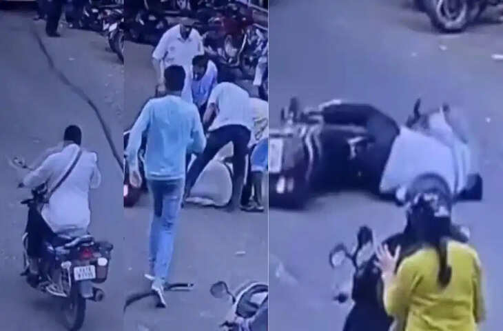 चलते बाइक सवार पर अचानक गिरी पेड़ की सूखी डाल, CCTV में कैद हुआ खौफनाक हादसा