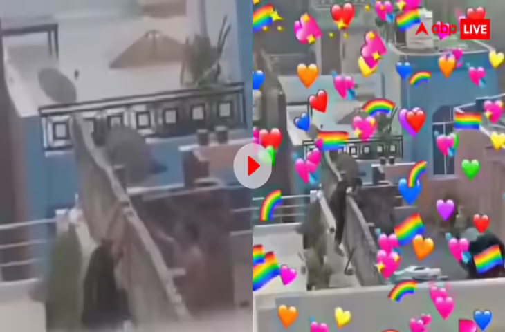 बारिश में बेखौफ रोमांस! छत पर चढ़कर कपल ने किया किस, इस रोमांटिक वायरल वीडियो ने इन्टरनेट पर मचा दी खलबली&nbsp;