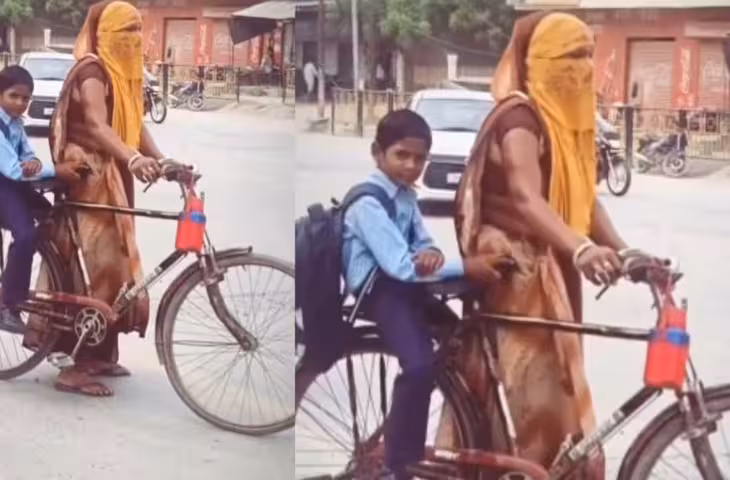 मां की ममता और मेहनत का Video वायरल, भारी ट्रैफिक में बच्चे को स्कूल पहुंचाती दिखी महिला