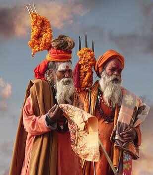 Why do sadhus and ascetics wear black saffron and white color clothes 