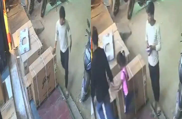 शोरूम के बाहर से AC लेकर फरार हुआ शख्स, घटना का वीडियो वायरल