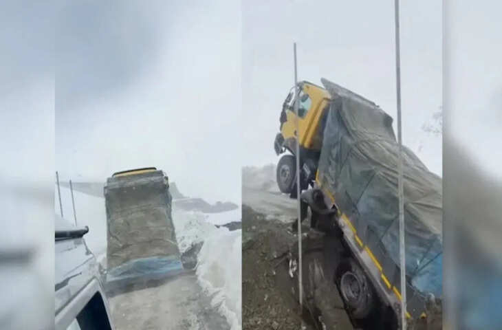 खतरनाक मोड़ पर सड़क बैठते ही मचा हड़कंप! ट्रक आधा धंसा, लेकिन कार ड्राइवर की तेजी ने बचा ली जान&mdash;देखें वायरल वीडियो