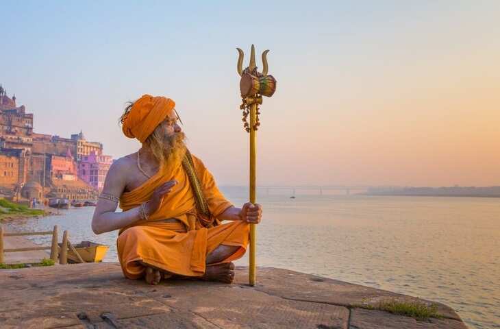 Why do sadhus and ascetics wear black saffron and white color clothes 