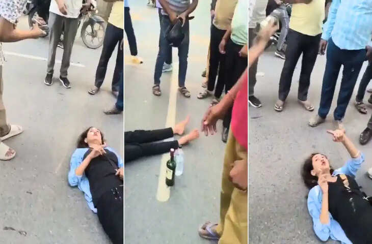 ग्रेटर नोएडा की सड़क पर महिला का हाई वोल्टेज ड्रामा, हाथ में सिगरेट और बगल में बोतल; VIDEO हुआ वायरल