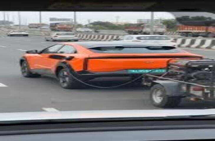 इलेक्ट्रिक कार के पीछे जनरेटर बांधकर निकले शख्स का VIDEO वायरल, देखकर लोग बोले - 'ये तो न्यूटन का भी बाप निकला....