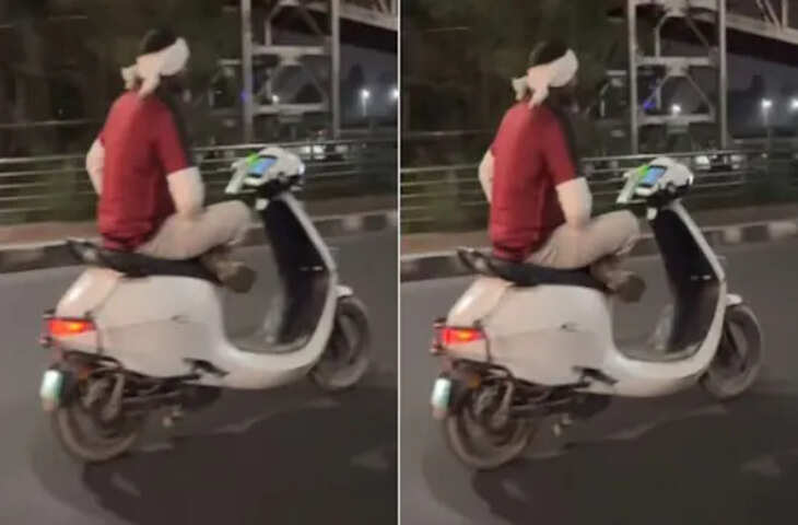 फोन पकड़, एक हाथ से चला रहा था स्कूटी, फिसलकर गिरा, कुचलने से बचा, देखें वीडियो