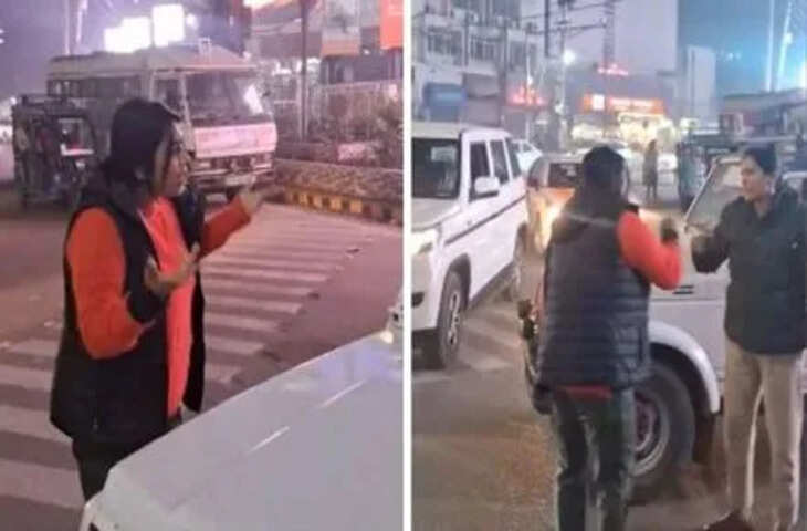 पुलिस की गाड़ी ने तोड़ा नियम तो महिला बीच सड़क पर लगा दी क्लास, यहाँ देखिये वायरल वीडियो 