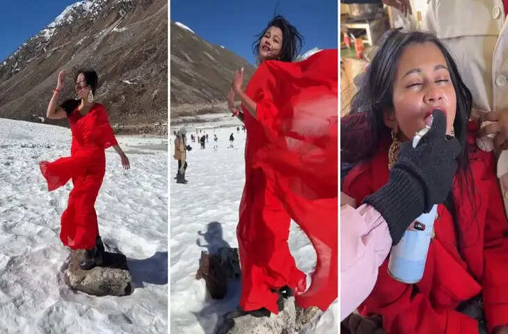रील के चक्कर में खुद &lsquo;रील&rsquo; बन गईं मैडम, बर्फीले पहाड़ों पर लाल साड़ी में डांस पड़ा भारी, देखें वीडियो