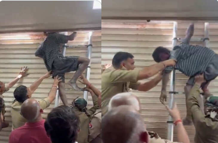 आसमान से गिरे खजूर में अटके! चोरी करते पकड़ा गया चोर, शटर में फंसी गर्दन का VIDEO वायरल
