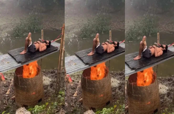 OMG:&nbsp;ठंड से बचने के लिए दहकती आग पर ही लेट गया युवक, वीडियो देख&nbsp;यूजर्स बोले - 'सिर्फ लाइक्स की भूख&nbsp;