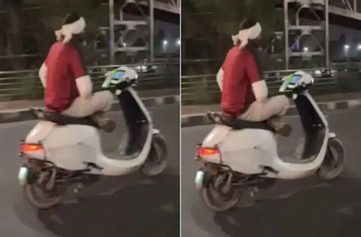 फोन पकड़, एक हाथ से चला रहा था स्कूटी, फिसलकर गिरा, कुचलने से बचा