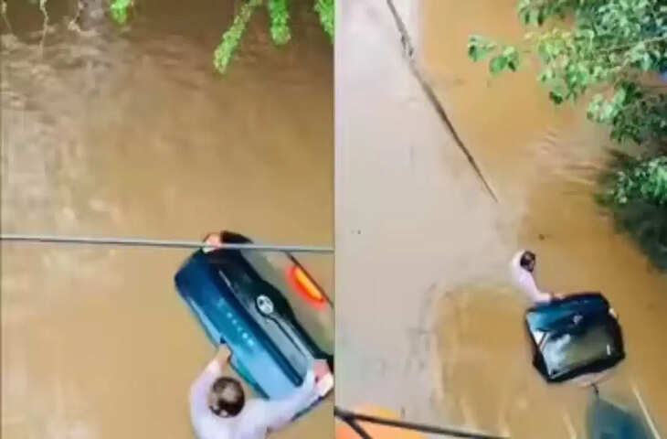 बाढ़ के बीच Tata Nexon के लिए मालिक का अनोखा प्यार, रेस्क्यू आने तक नहीं छोड़ा कार का साथ, VIDEO ने जीता दिल